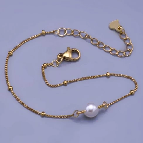 Jemný pozlacený náramek z chirurgické oceli s perličkou Swarovski