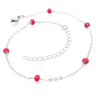 Ocelový náramek na nohu s červenými korálky