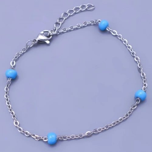 Náramek z chirurgické oceli s modrými perličkami