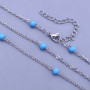 Náramek z chirurgické oceli s modrými perličkami