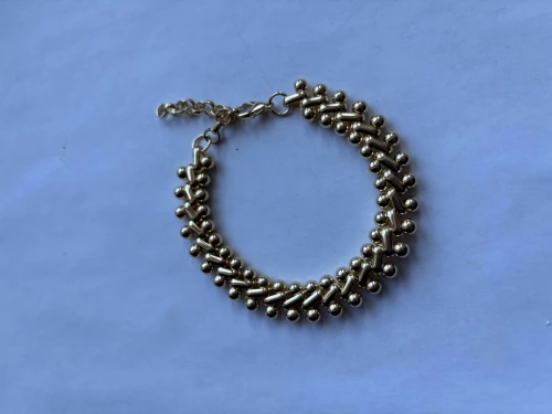 Krásný zlacený náramek z chirurgické oceli