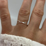 Překřížený stříbrný prsten tepaný