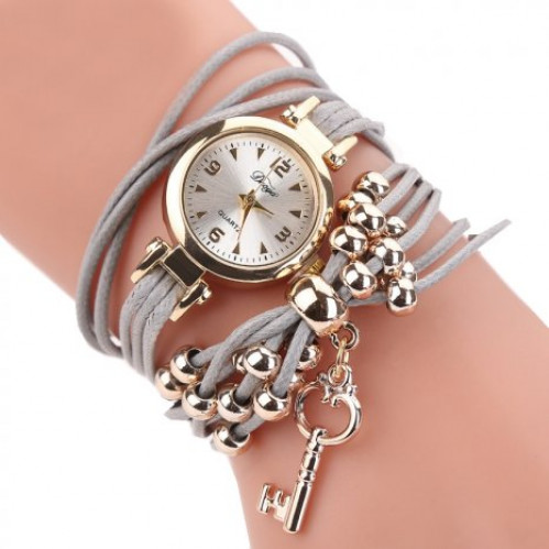 Moderní dámské hodinky šedé páskové s kuličkami a klíčem - H173-1