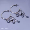 Předchozí: Náušnice z chirurgické oceli kruhy s řetízky a krystaly Swarovski