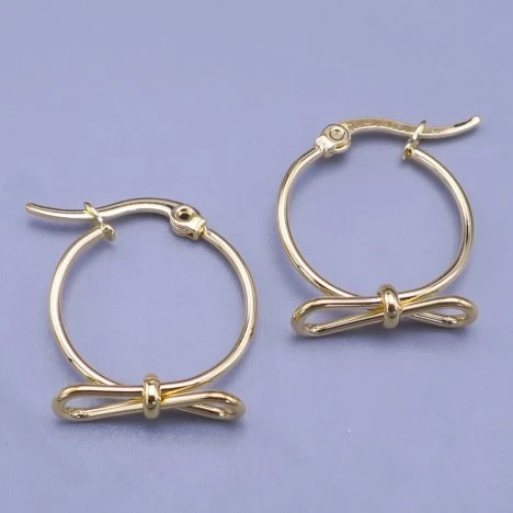 Krásné kroužkové náušnice s mašlí z chirurgické oceli - zlaceno